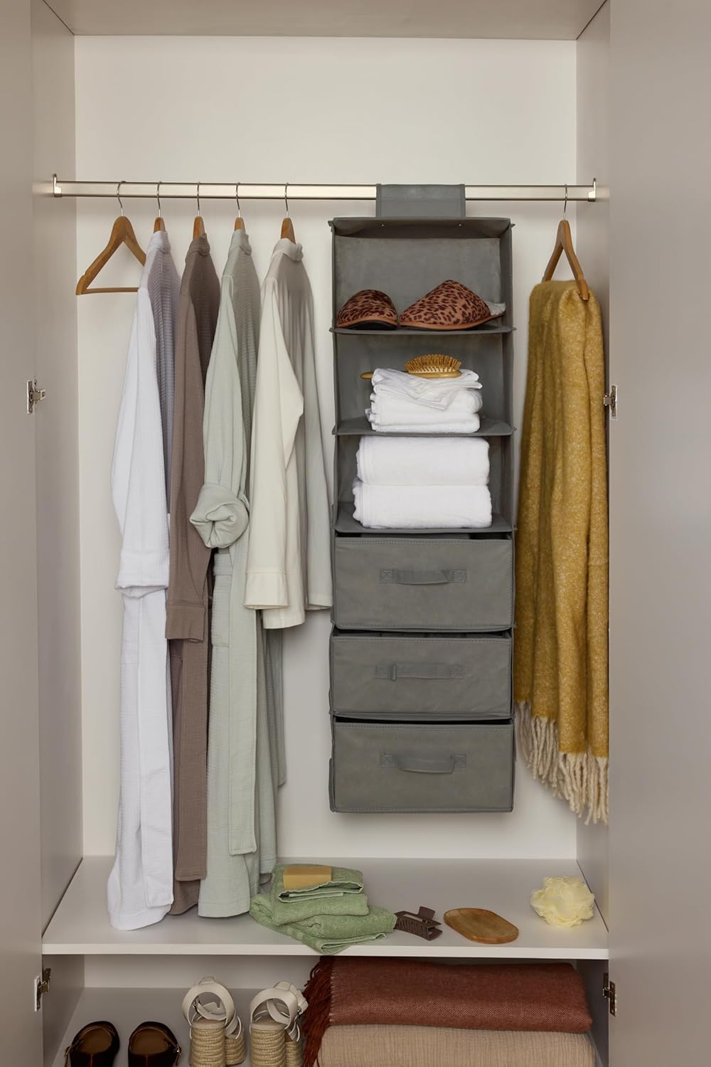 Amazon Basics hanging closet shelf with three removable drawers